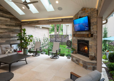 Stone Fireplace and OUTDECO Screens on Screen Porch Addition in Eden Prairie