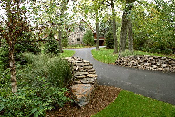 Orono Minnesota Asphalt Driveway with a Dry-Stacked Wall