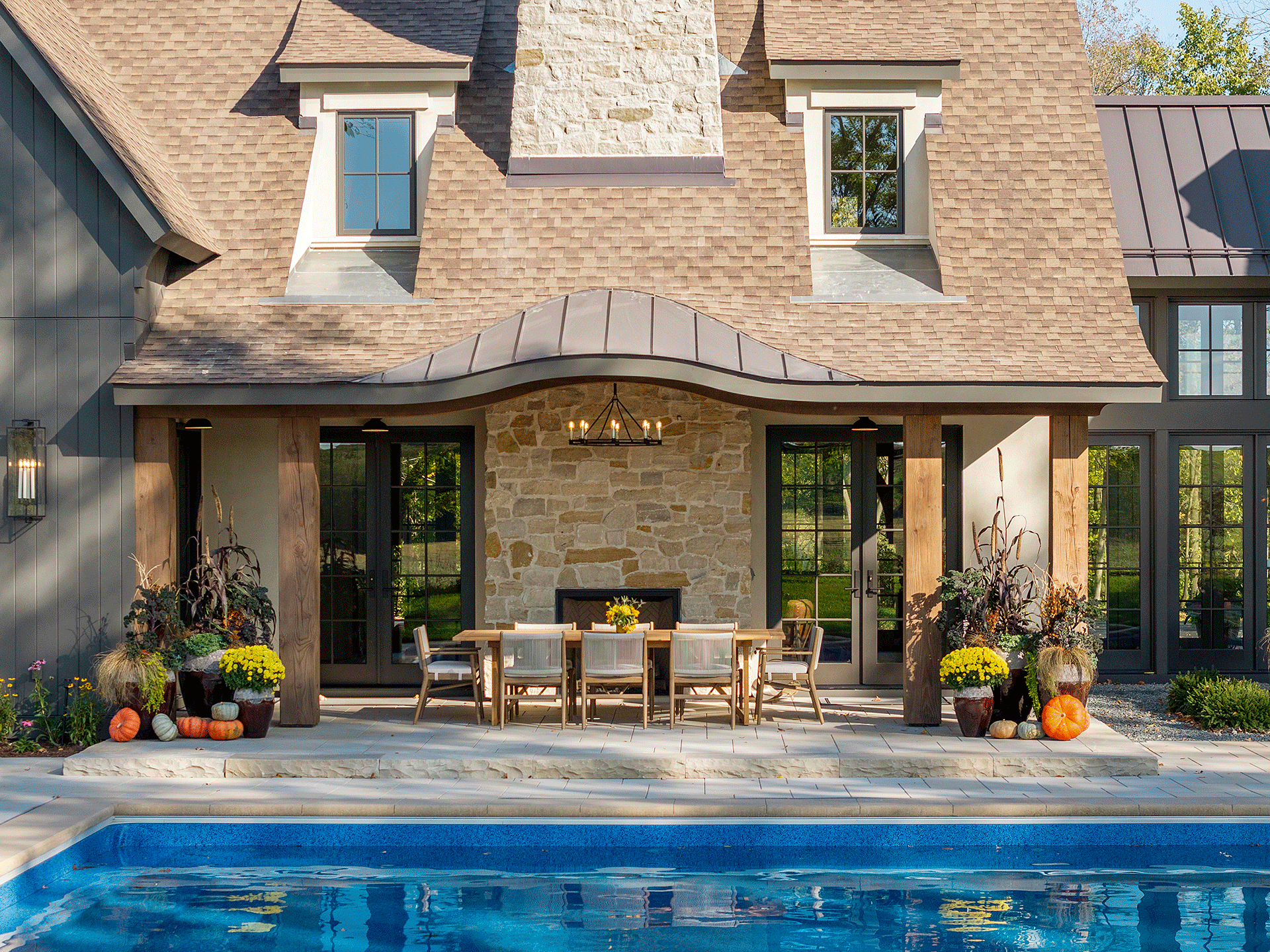 Back Patio with Custom Vinyl Pool and Covered Dinning Area with Fire Feature