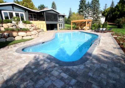 Custom Concrete Pool Remodel with Paver Patio and Cedar Pergola in Orono Minnesota