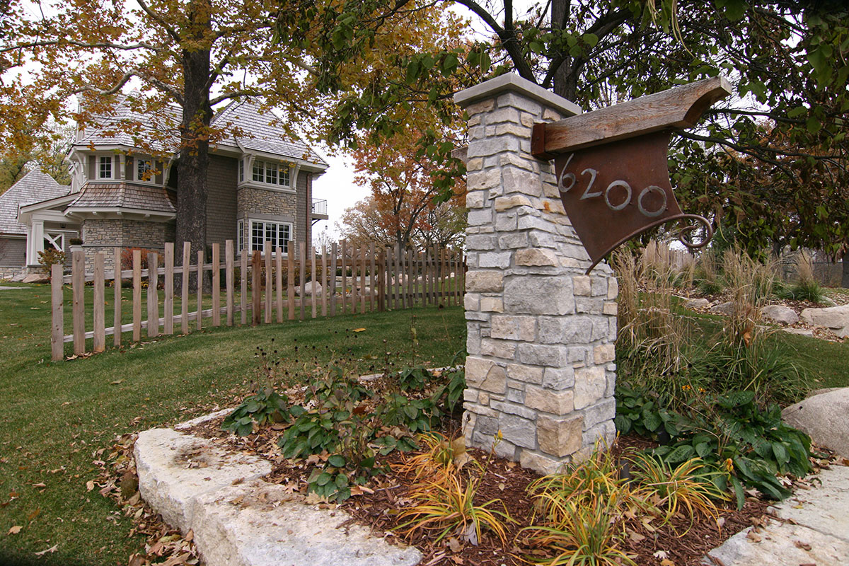Custom-Front-Entry-Sign-and-Pillar-constructed-out-of-stone-and-metal-in-edina-mn