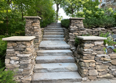 Dry Stacked Pillars Along Side Limestone Staircase