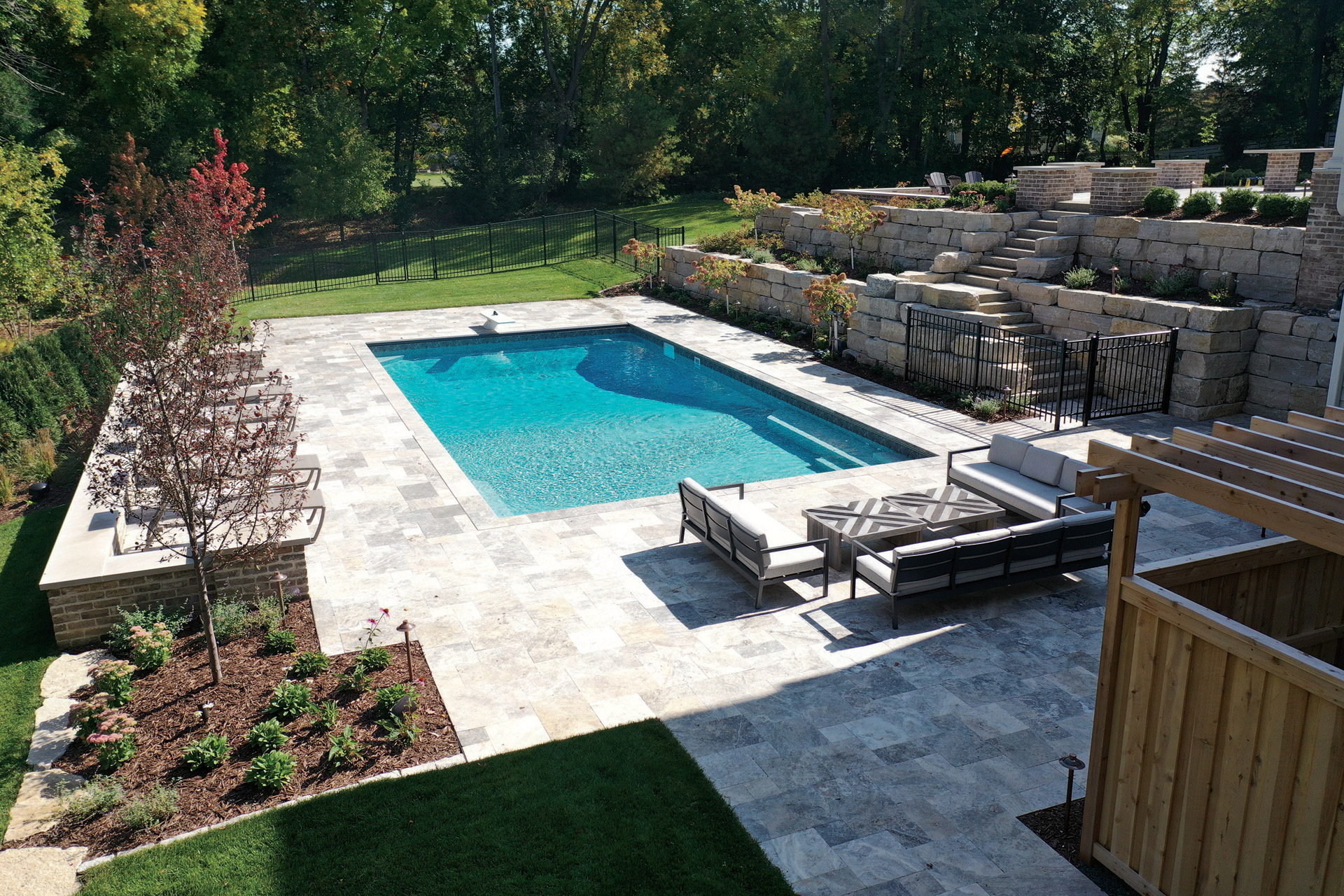 Swimming Pool and Patio Area with Travertine Tile in Edina, MN