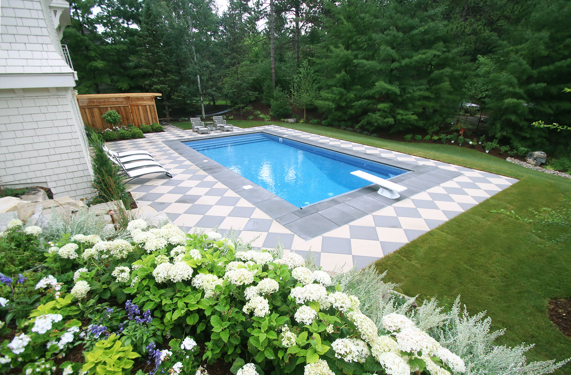 Minnetonka-Pool-addition-with-checker-board-patio-and-new-upper-patio-with-outdoor-shower