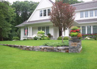 Natural Front Entry with Dry-Stacked Wall and Address Sign