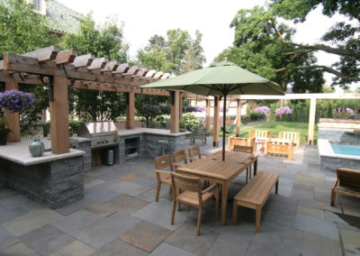 Minneapolis Granite Outdoor Kitchen with Cedar Arbor and Bluestone Patio