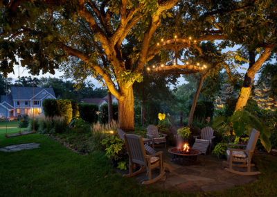 Outdoor Lighting in Planting Beds and Chandelier over Fire Feature and Patio in Eden Prairie, Minnesota