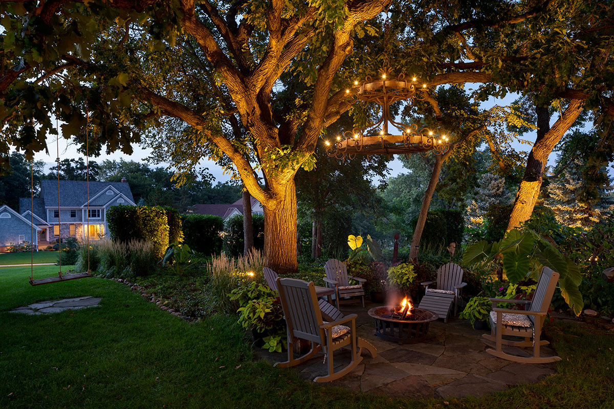 Outdoor Lighting in Planting Beds and Chandelier over Fire Feature and Patio in Eden Prairie, Minnesota