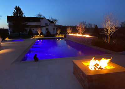 Pool and Spa at night with outdoor lighting in Orono Minnesota