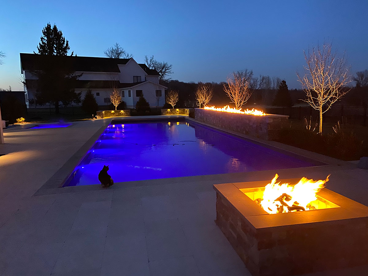 Pool and Spa at night with outdoor lighting in Orono Minnesota