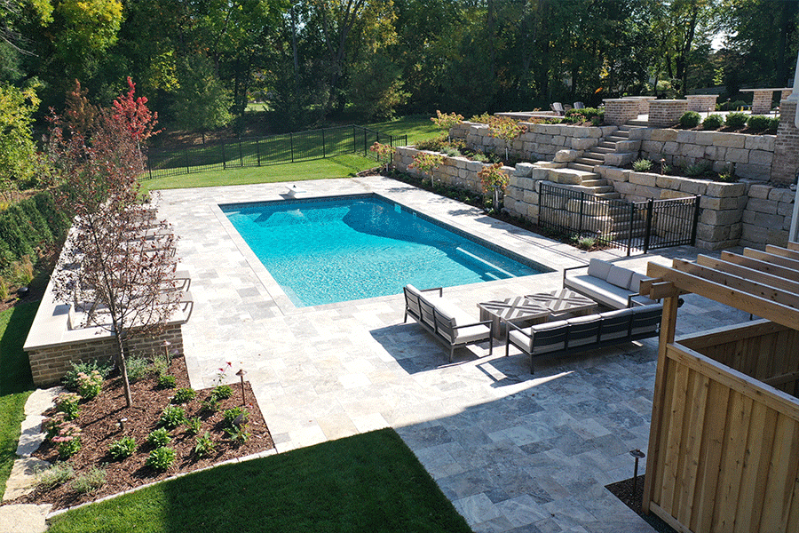 Resort Style Entertaining with New Concrete Pool and Tiered Stone Walls
