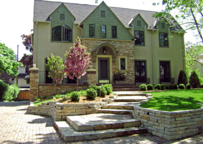 Front Entry Steps and Walking Path with Stone Retaining Wall