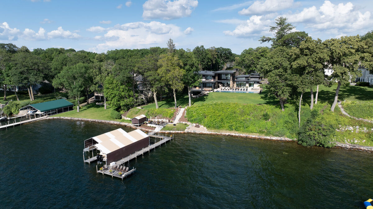 Arial from Lake Minnetonka looking back at Modern Luxury home