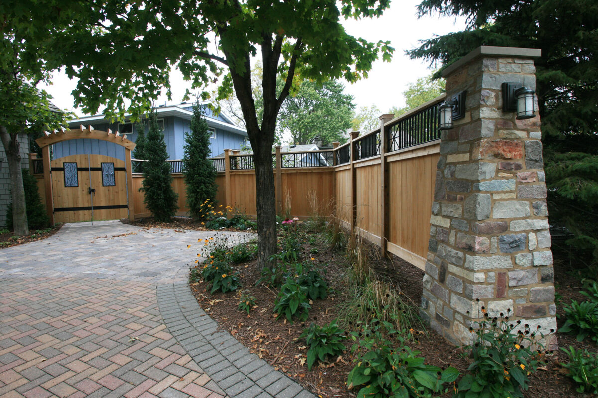 Cedar Wood Fencing with Metal Detail for Driveway Security and Screening from Neighbors in Wayzata, Minnesota